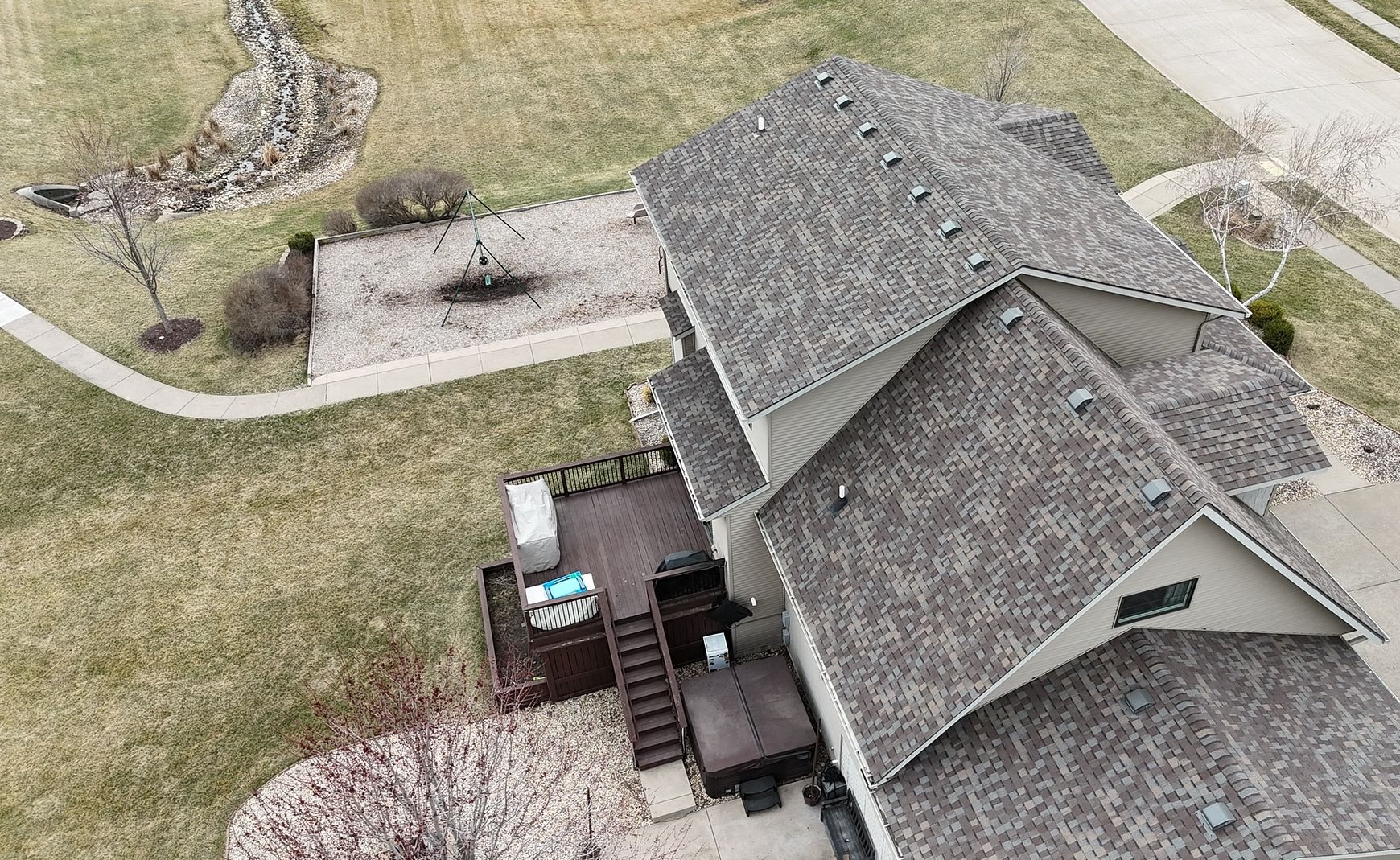 The same Bettendorf, Iowa roof after replacement with CertainTeed Landmark Pro Prairie Wood shingles by Mitten, side view