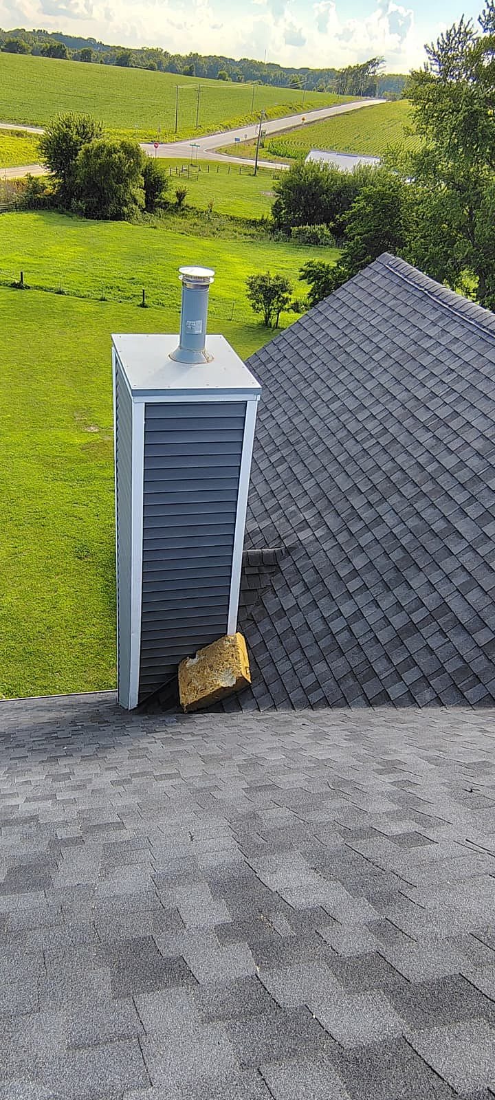 Close view of CertainTeed Landmark Pro shingles in Moire Black on a Long Grove, Iowa home